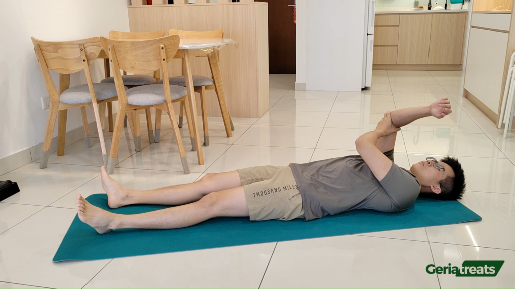 064 Elbow extension supine - self assisted